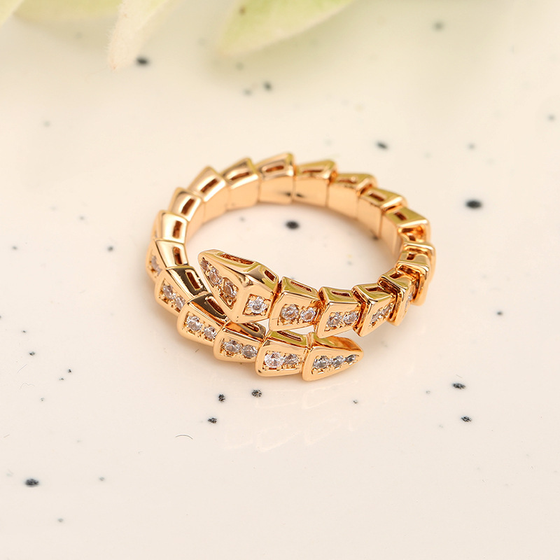 Gold-plated snake bone ring with full diamonds